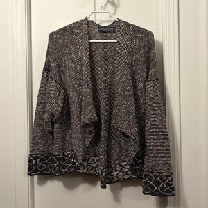 Lovely Multi coloured open cardigan.
Made in Scotland
Ptp27